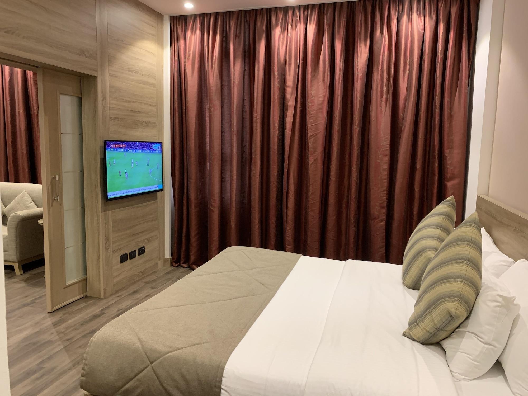 卡尔顿埃尔莫埃贝德酒店 达曼 外观 照片 A bedroom in the hotel